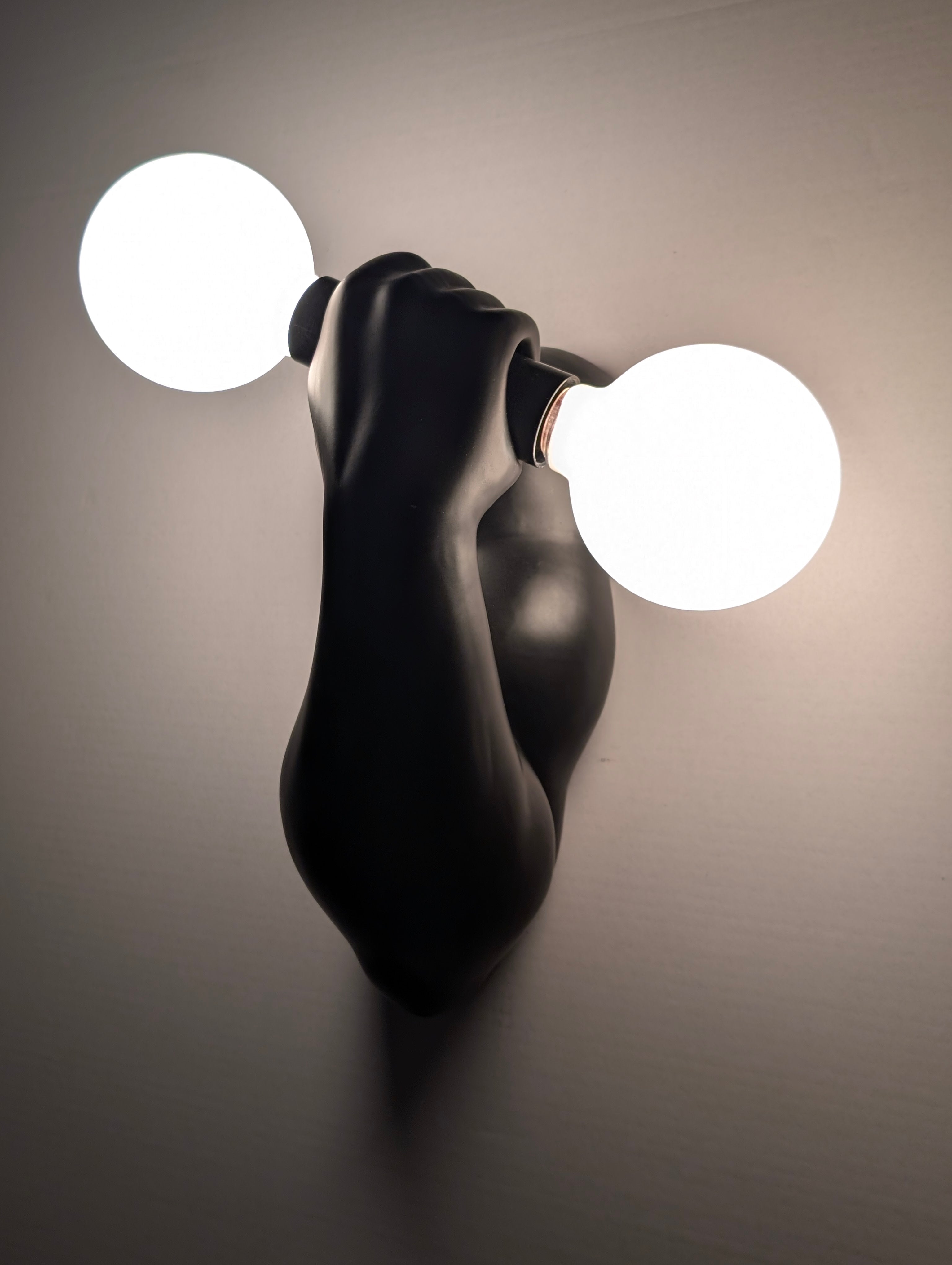 Black_Ceramic_Arm_Wall_Sconce_by_J.C._Peiré,_Sculptural_Design,_1970s,_France