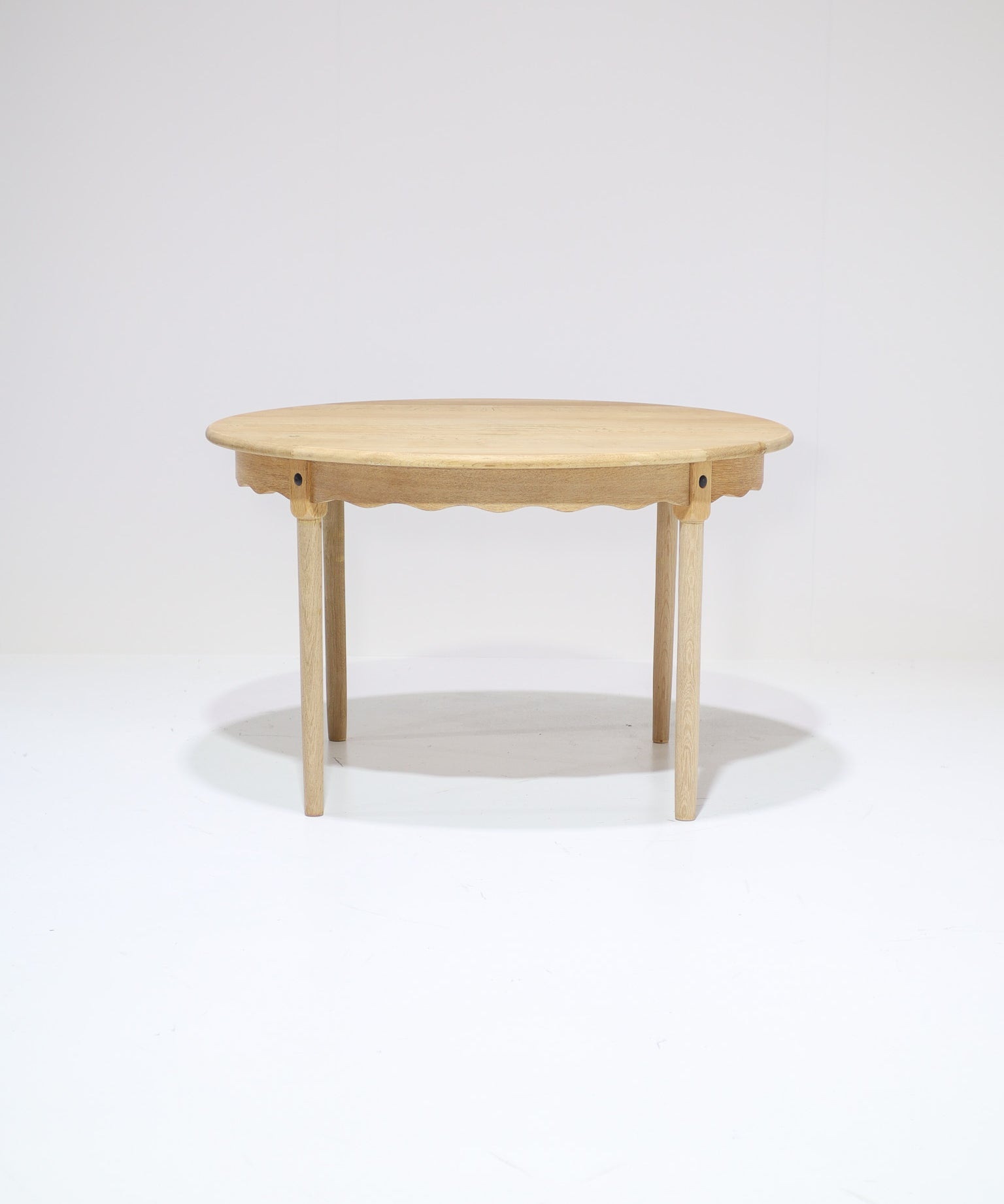 Kjaernulf_extendable_dining_table_in_oak,_Danish_vintage