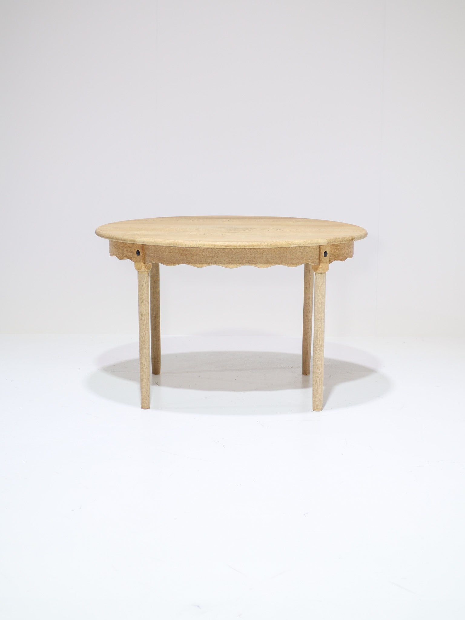Kjaernulf_extendable_dining_table_in_oak,_Danish_vintage