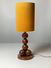 Dutch_handcrafted_commemorative_wooden_sphere_ball_table_lamp,_1976