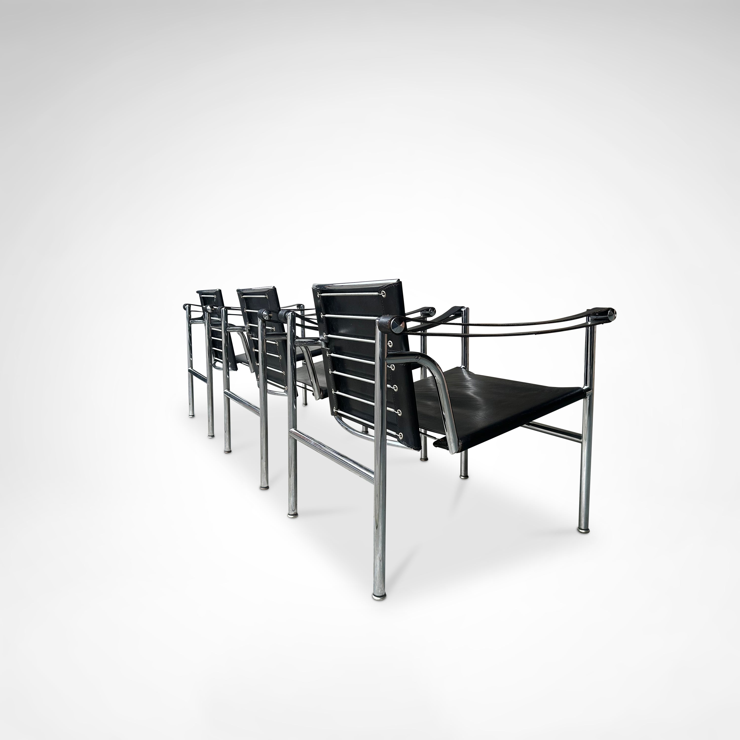 Set_of_3_LC1_Basculant_Armchairs_by_Le_Corbusier_for_Cassina,_1970s–80s