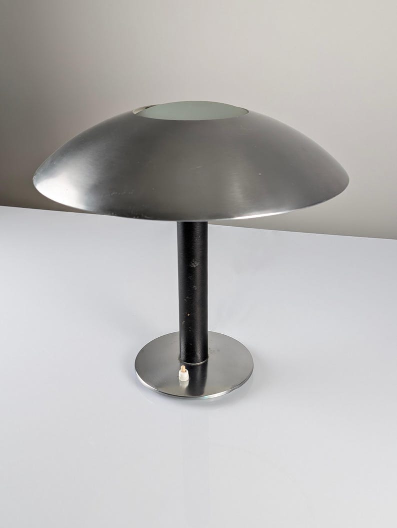 Leather_table_lamp_by_Metalarte,_1962