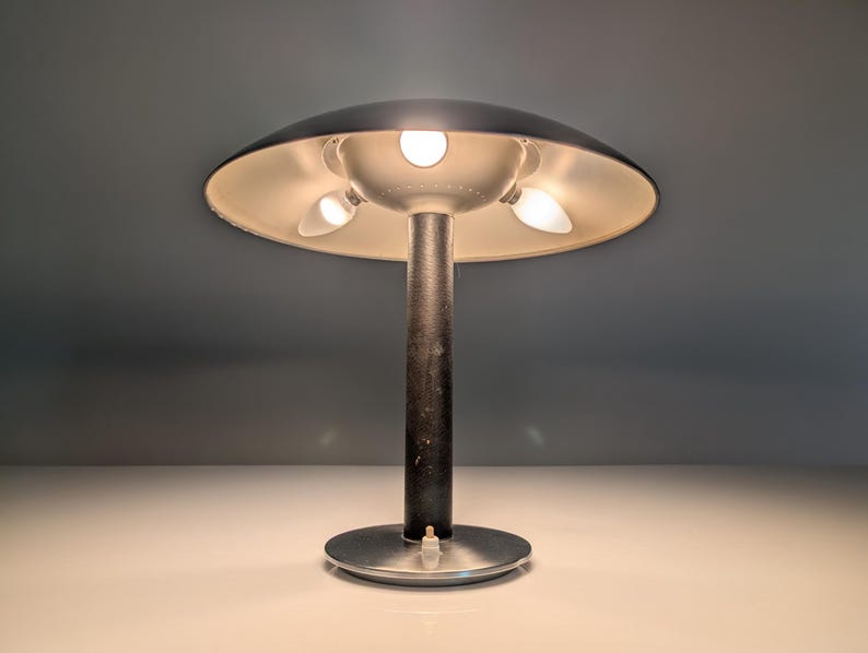 Leather_table_lamp_by_Metalarte,_1962