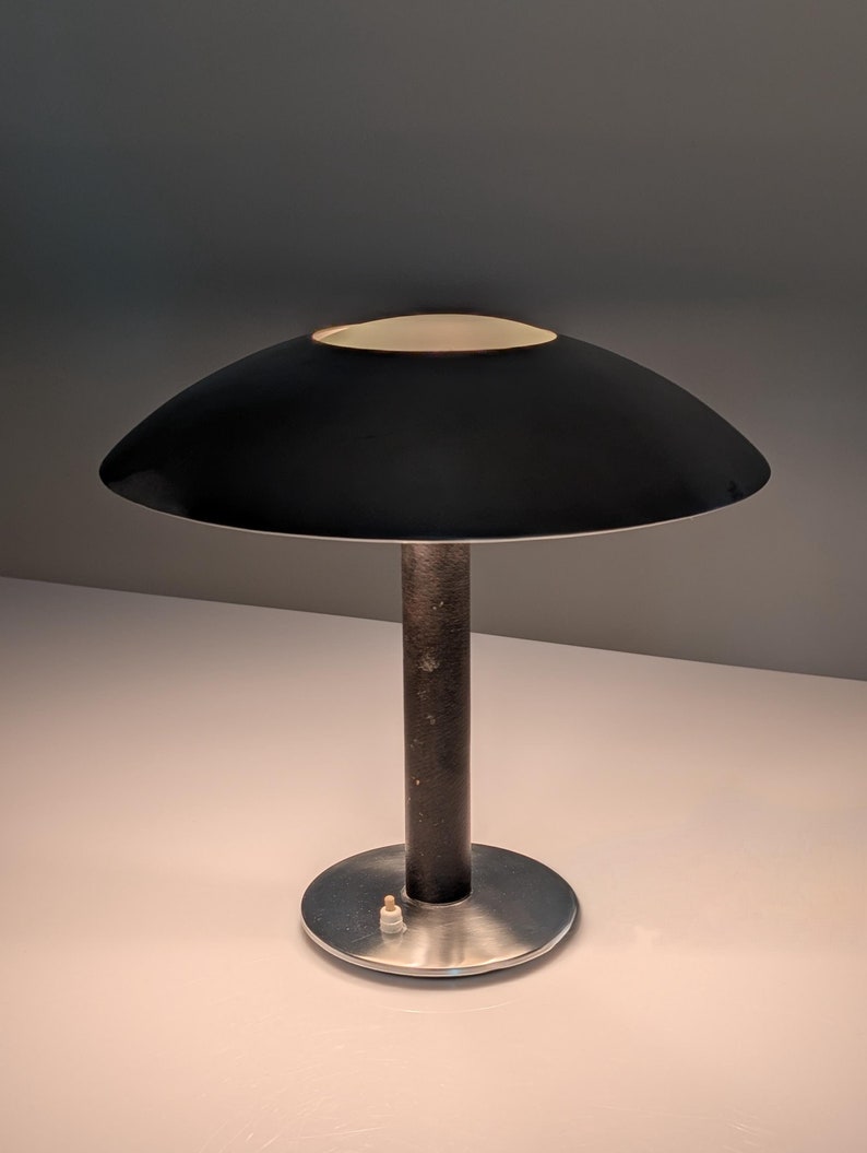 Leather_table_lamp_by_Metalarte,_1962