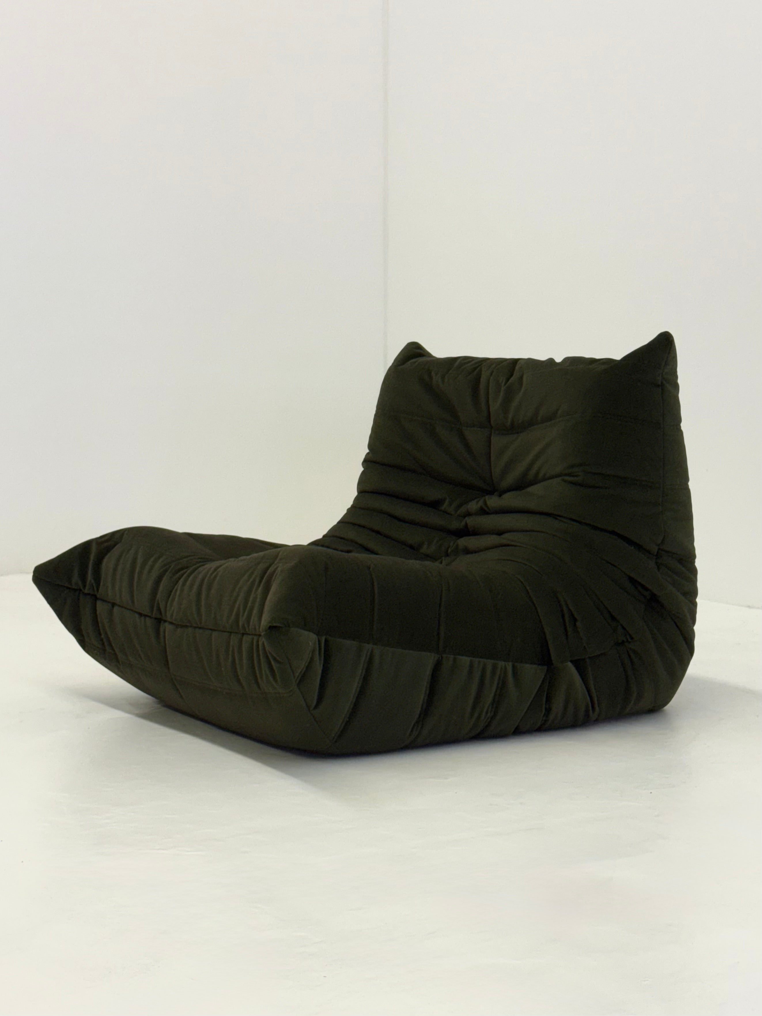 Ligne_Roset_Togo_1-seater_in_dark_green_velvet
