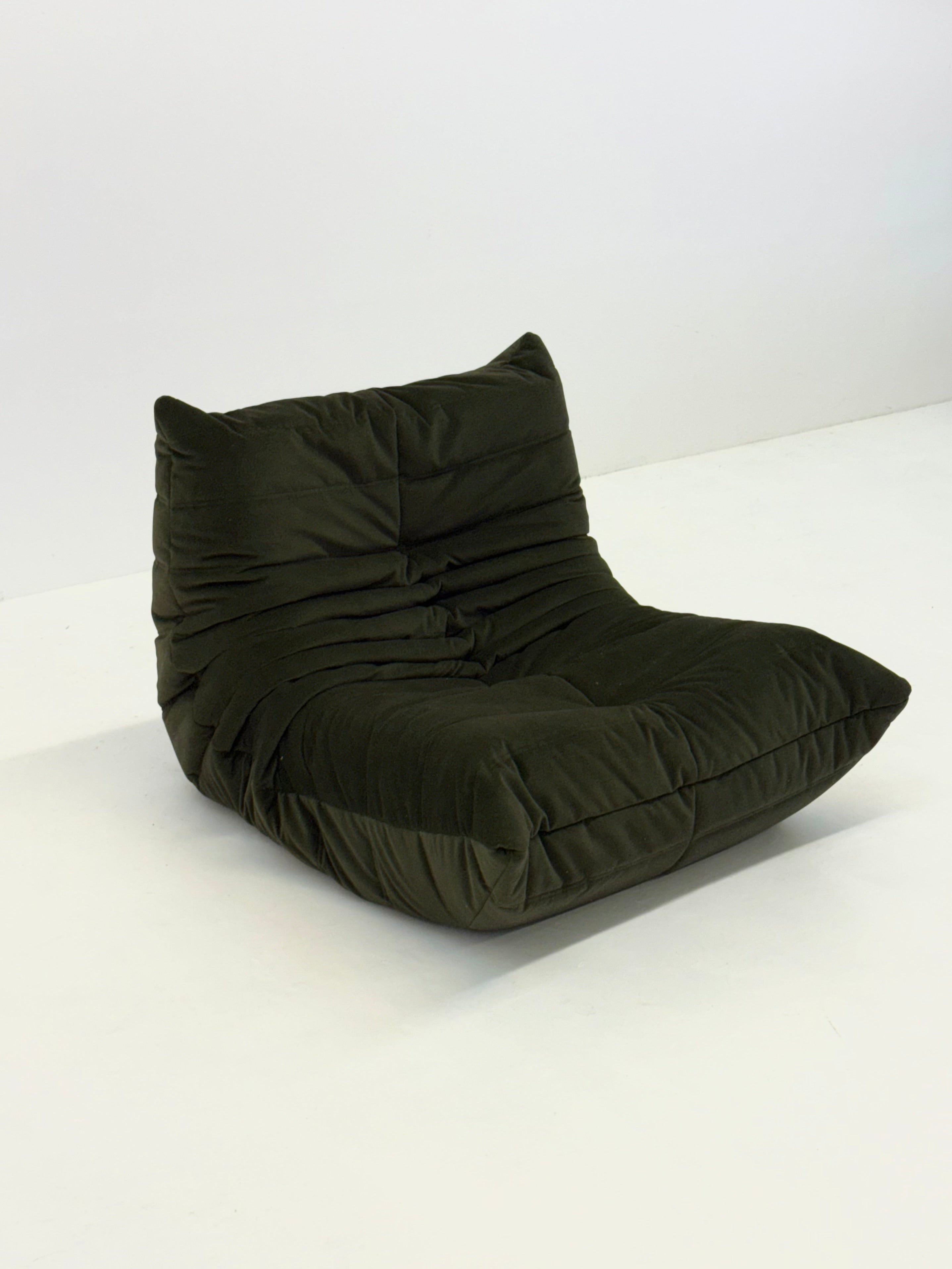 Ligne_Roset_Togo_1-seater_in_dark_green_velvet