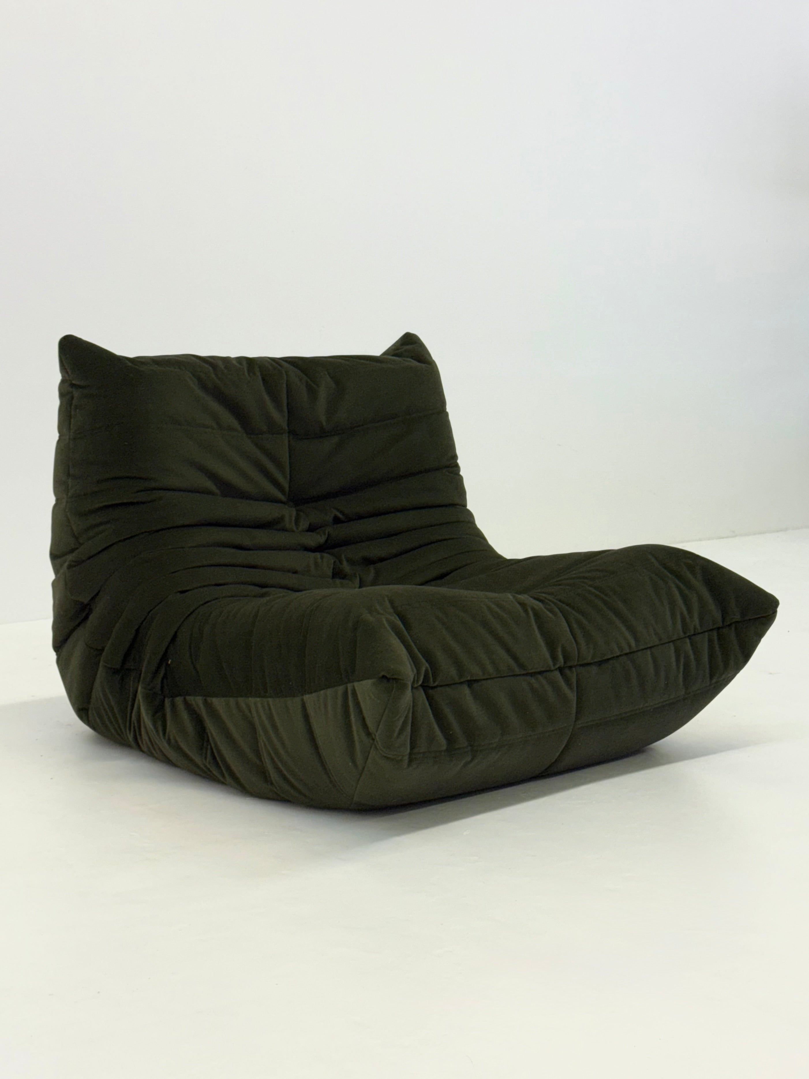 Ligne_Roset_Togo_1-seater_in_dark_green_velvet