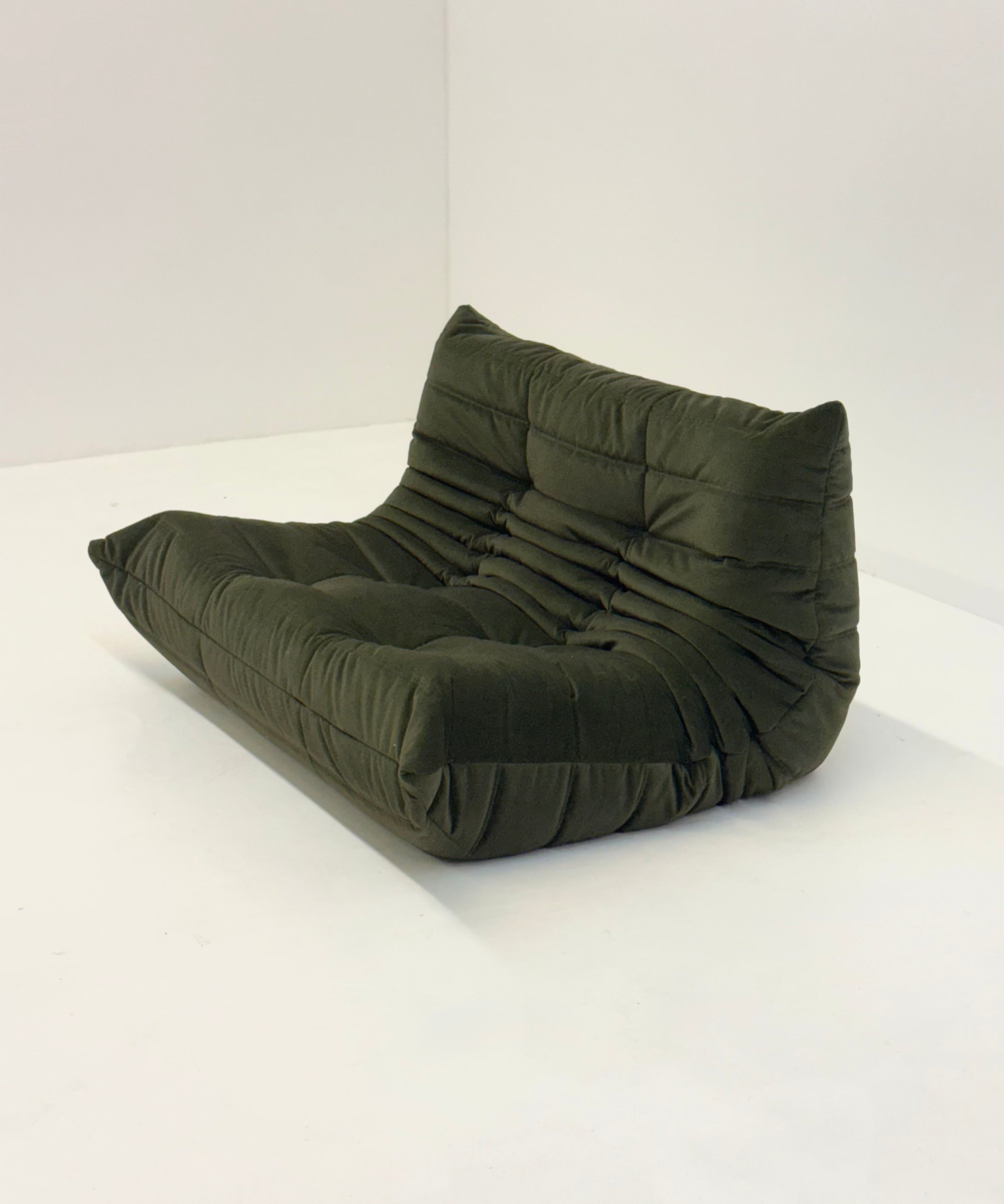 Ligne_Roset_Togo_2-seat_element_in_dark_green_velvet