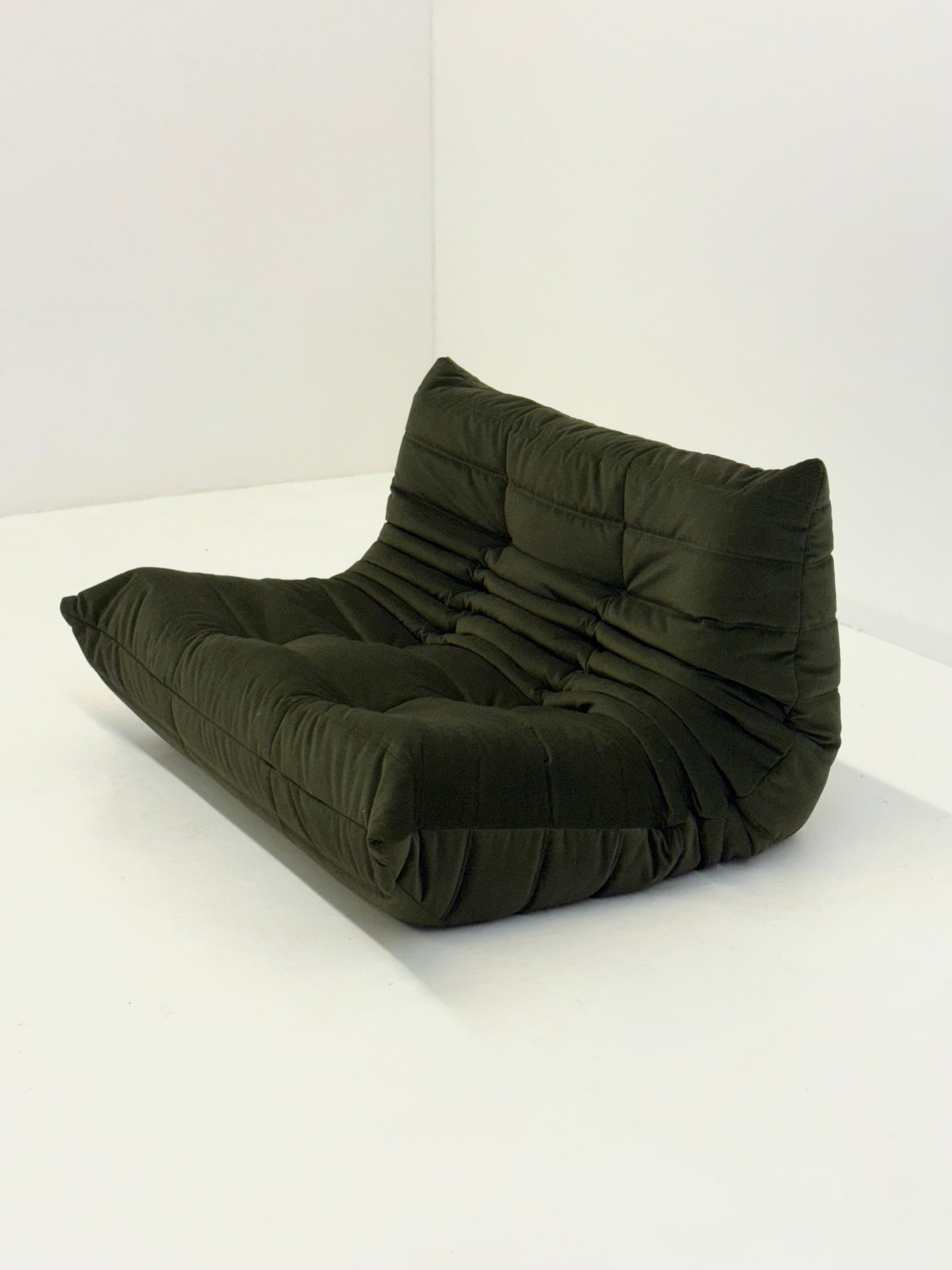 Ligne_Roset_Togo_2-seat_element_in_dark_green_velvet