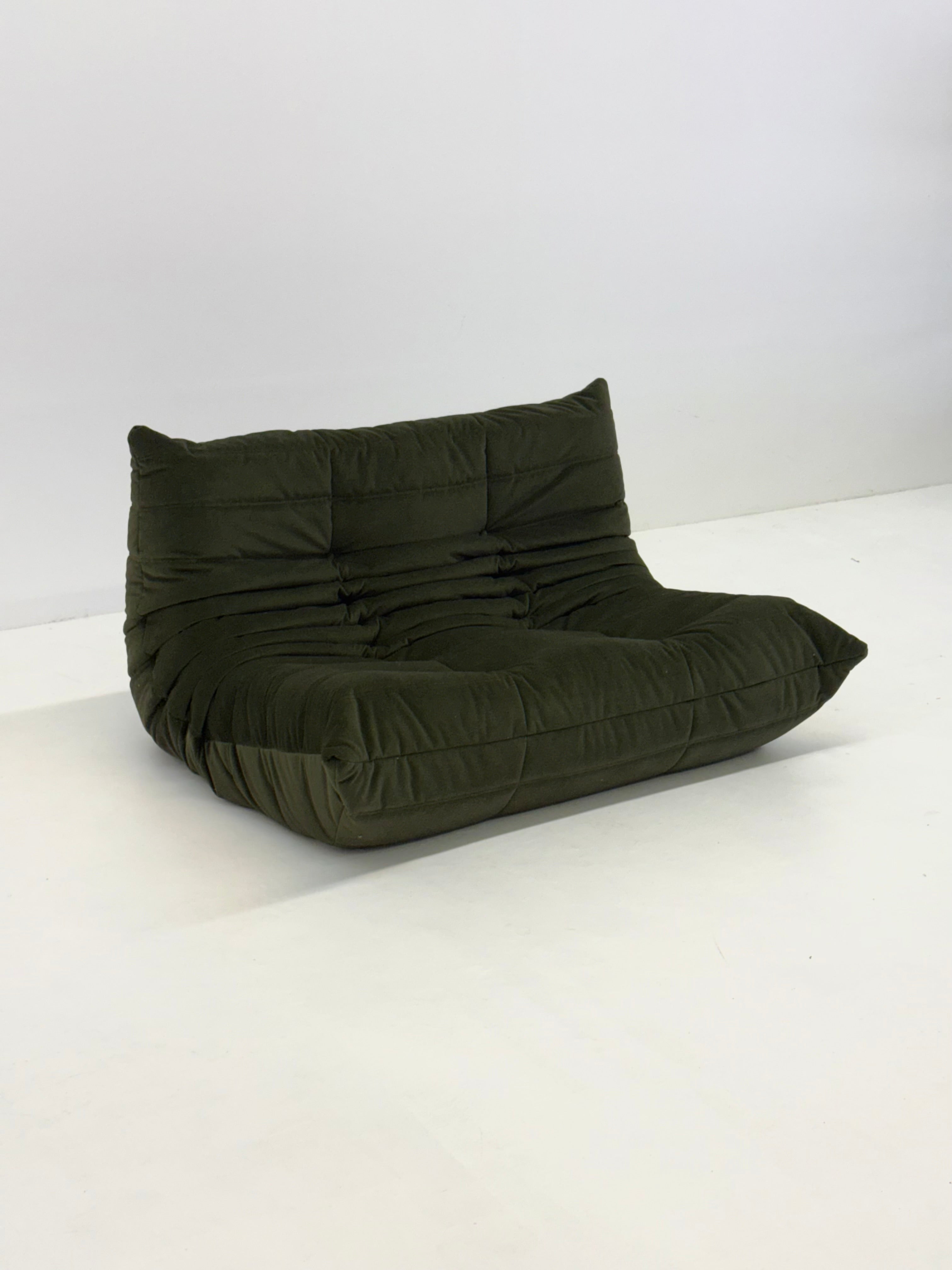 Ligne_Roset_Togo_2-seat_element_in_dark_green_velvet