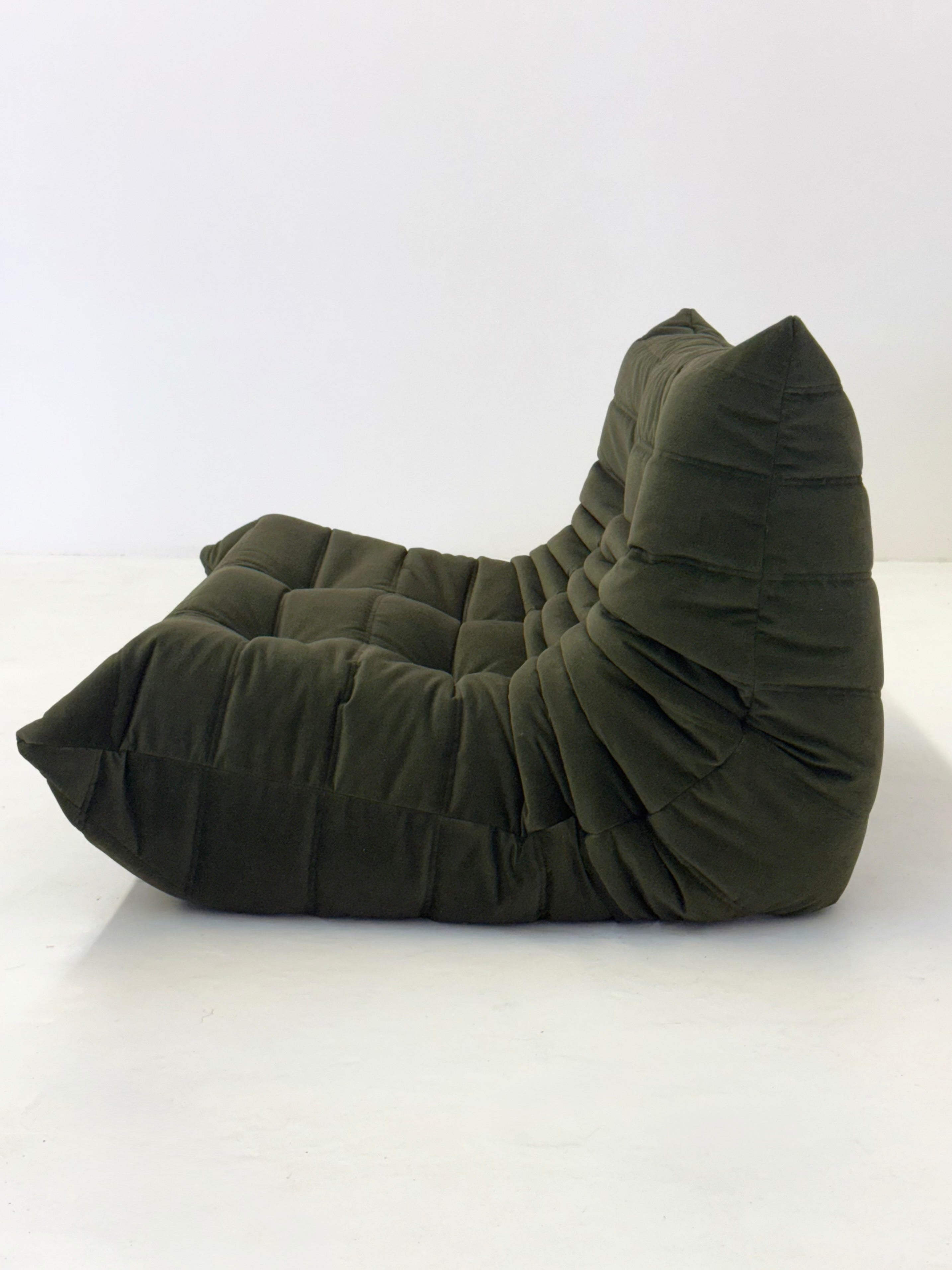 Ligne_Roset_Togo_2-seat_element_in_dark_green_velvet
