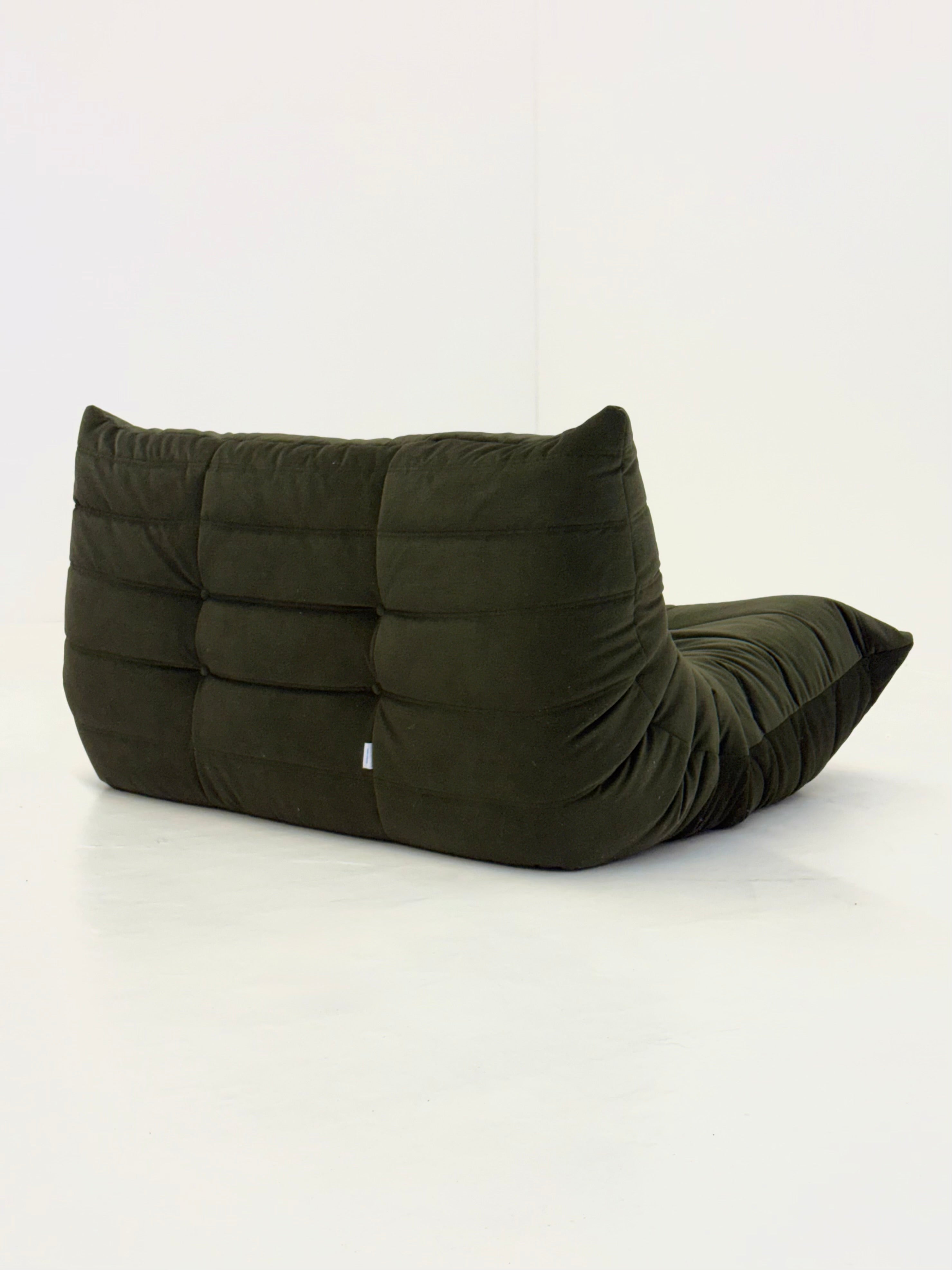 Ligne_Roset_Togo_2-seat_element_in_dark_green_velvet