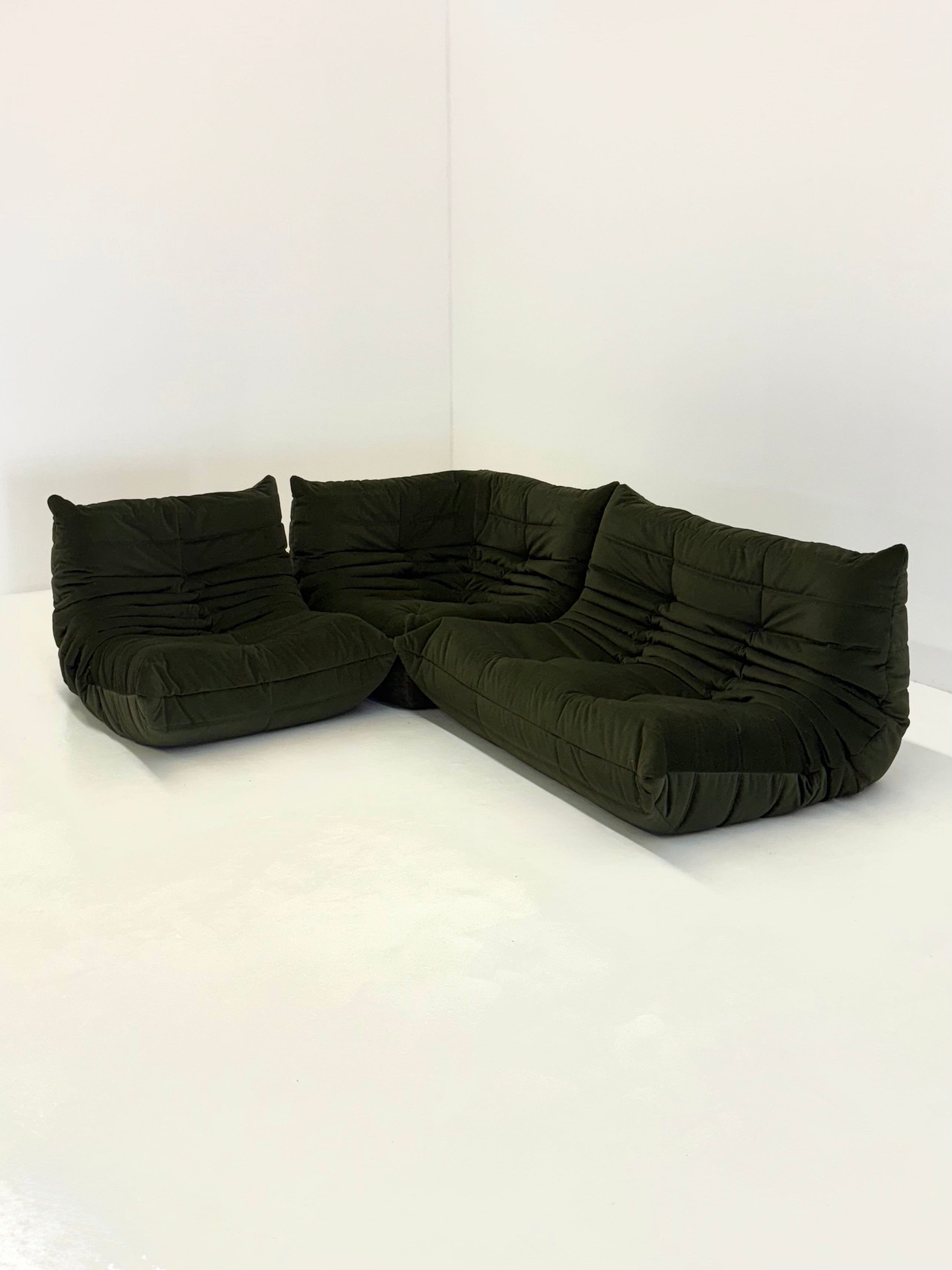 Ligne_Roset_Togo_2-seat_element_in_dark_green_velvet