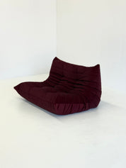 Ligne_Roset_Togo_2-seater_in_burgundy_red_velvet