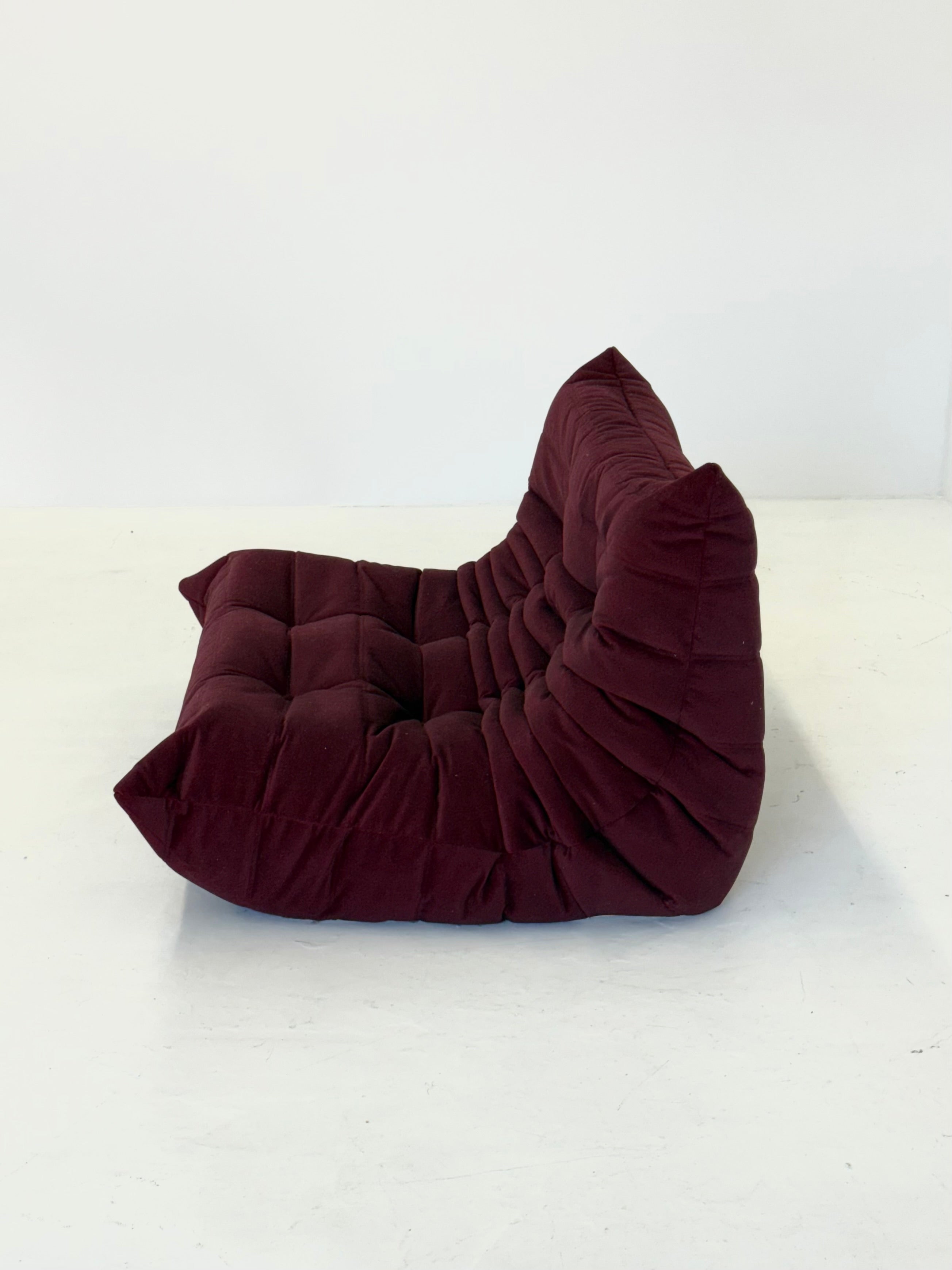 Ligne_Roset_Togo_2-seater_in_burgundy_red_velvet