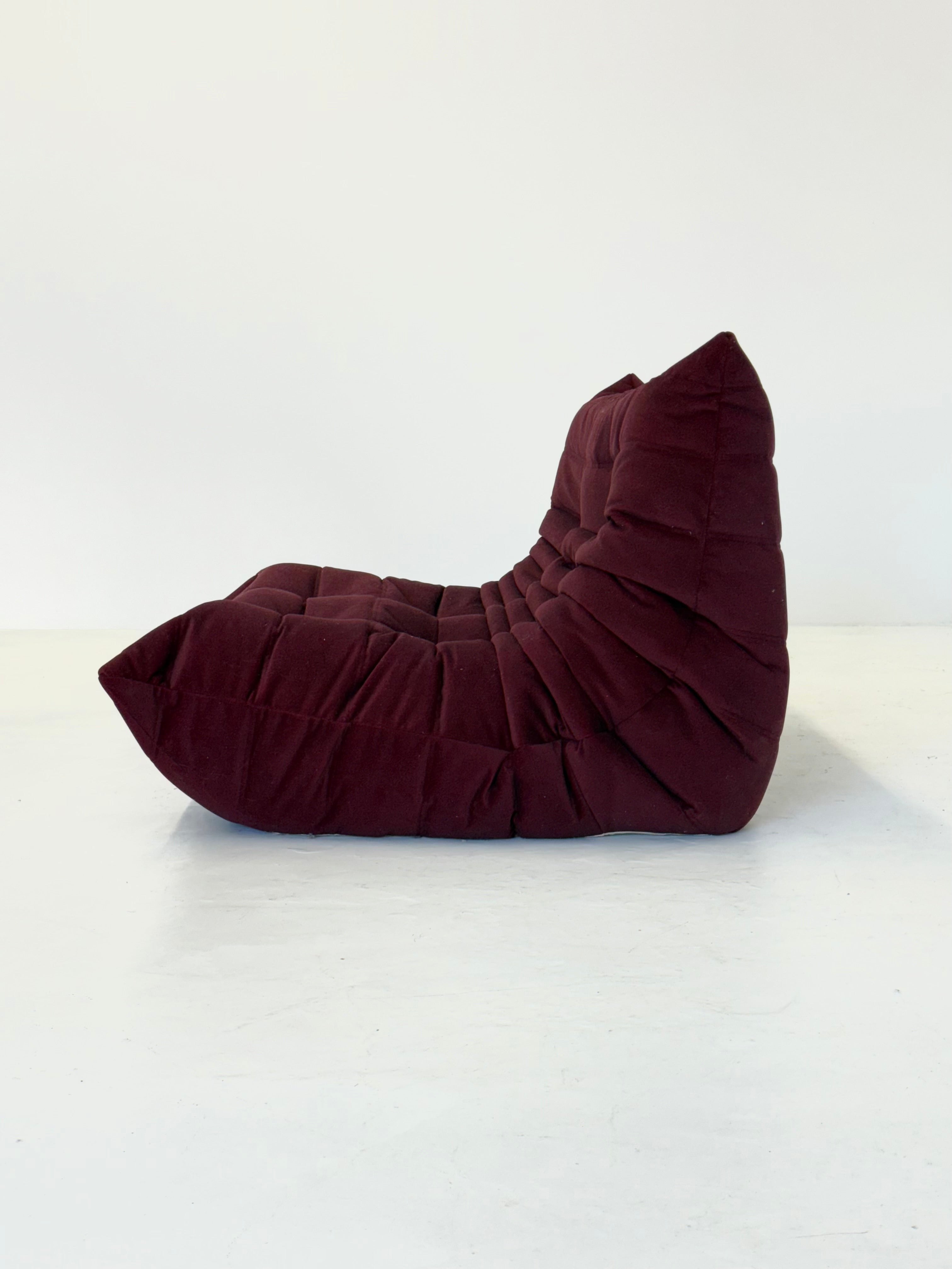 Ligne_Roset_Togo_2-seater_in_burgundy_red_velvet
