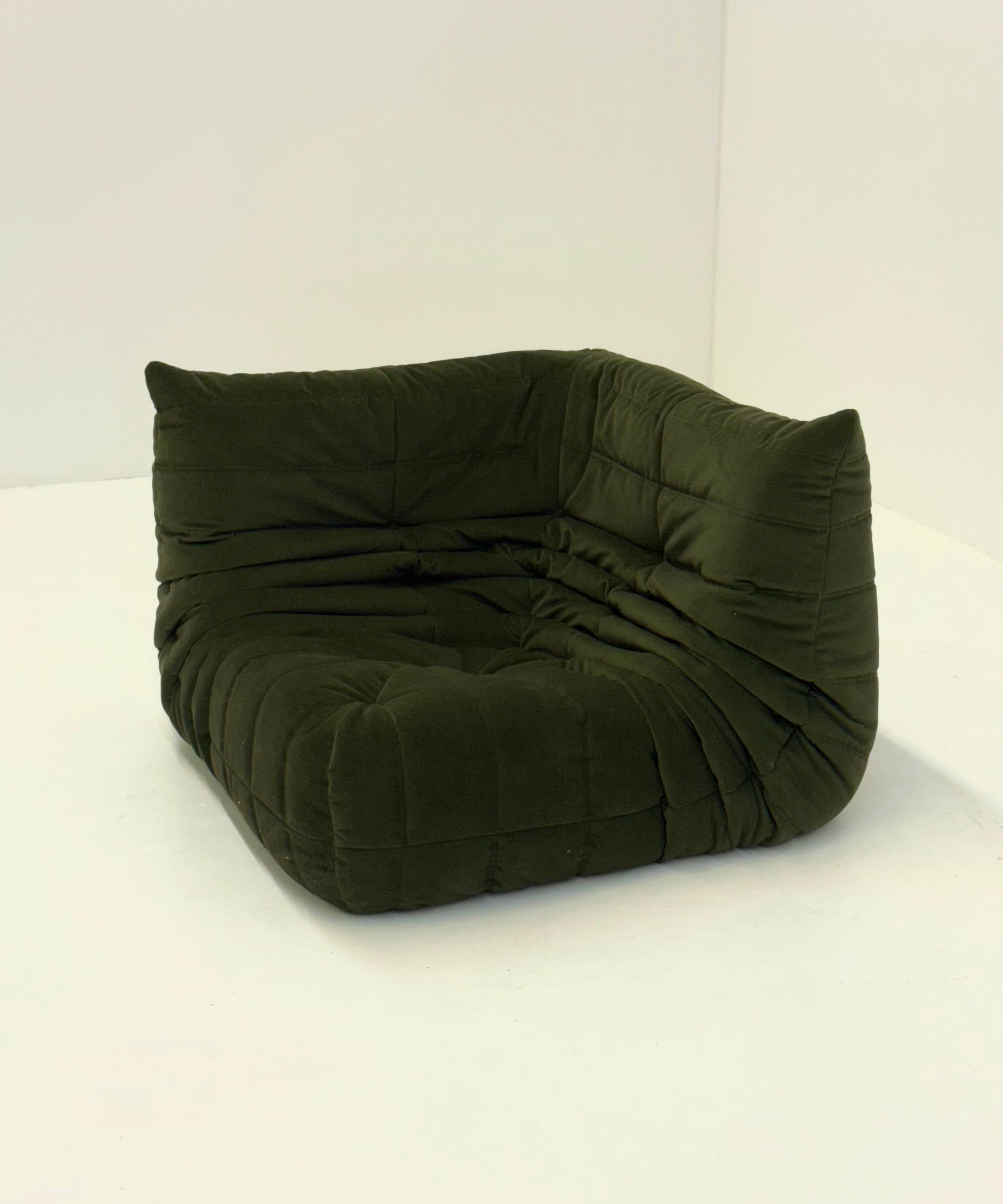Ligne_Roset_Togo_corner_element_1-seater_in_dark_green_velvet