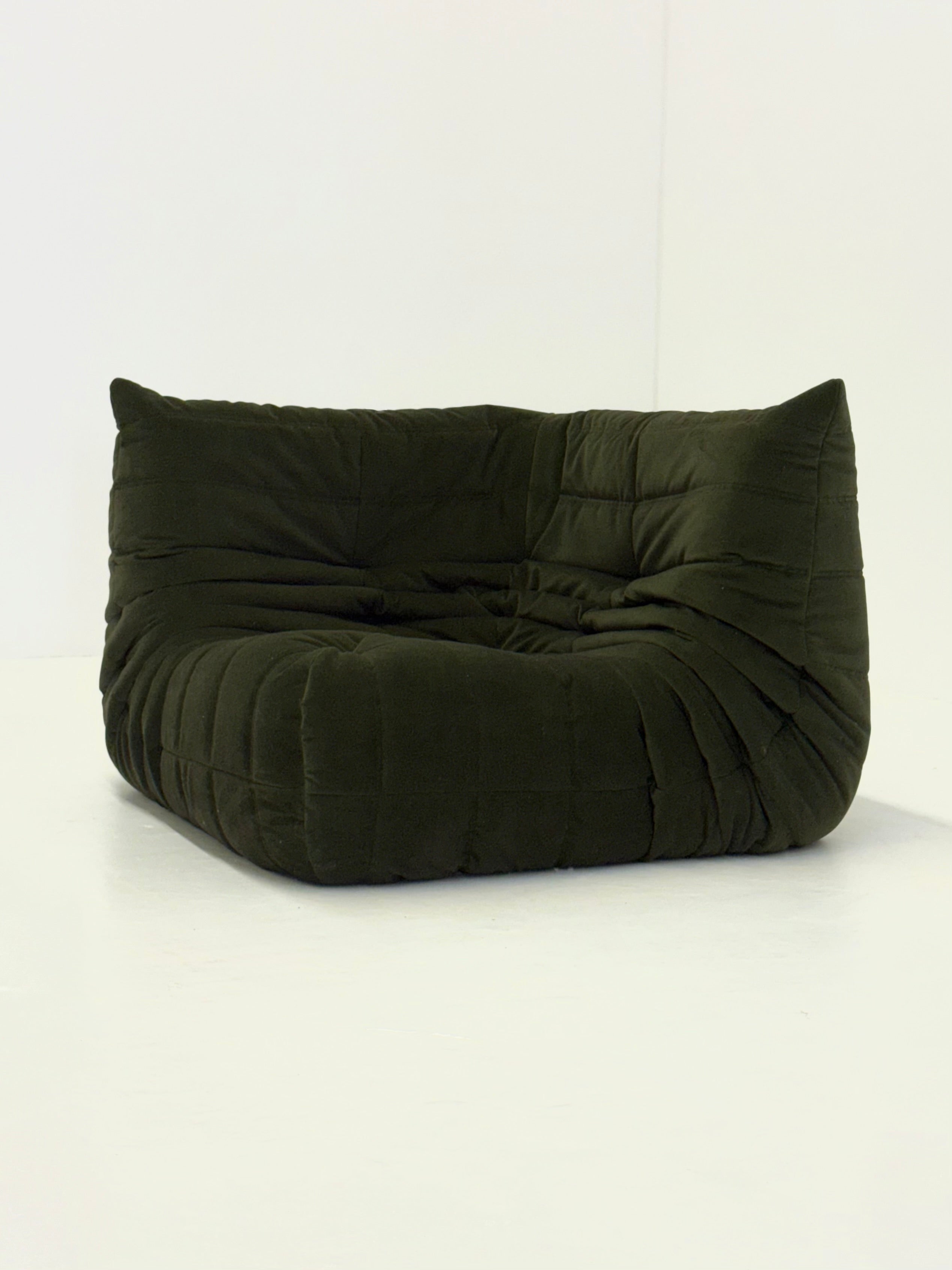 Ligne_Roset_Togo_corner_element_1-seater_in_dark_green_velvet