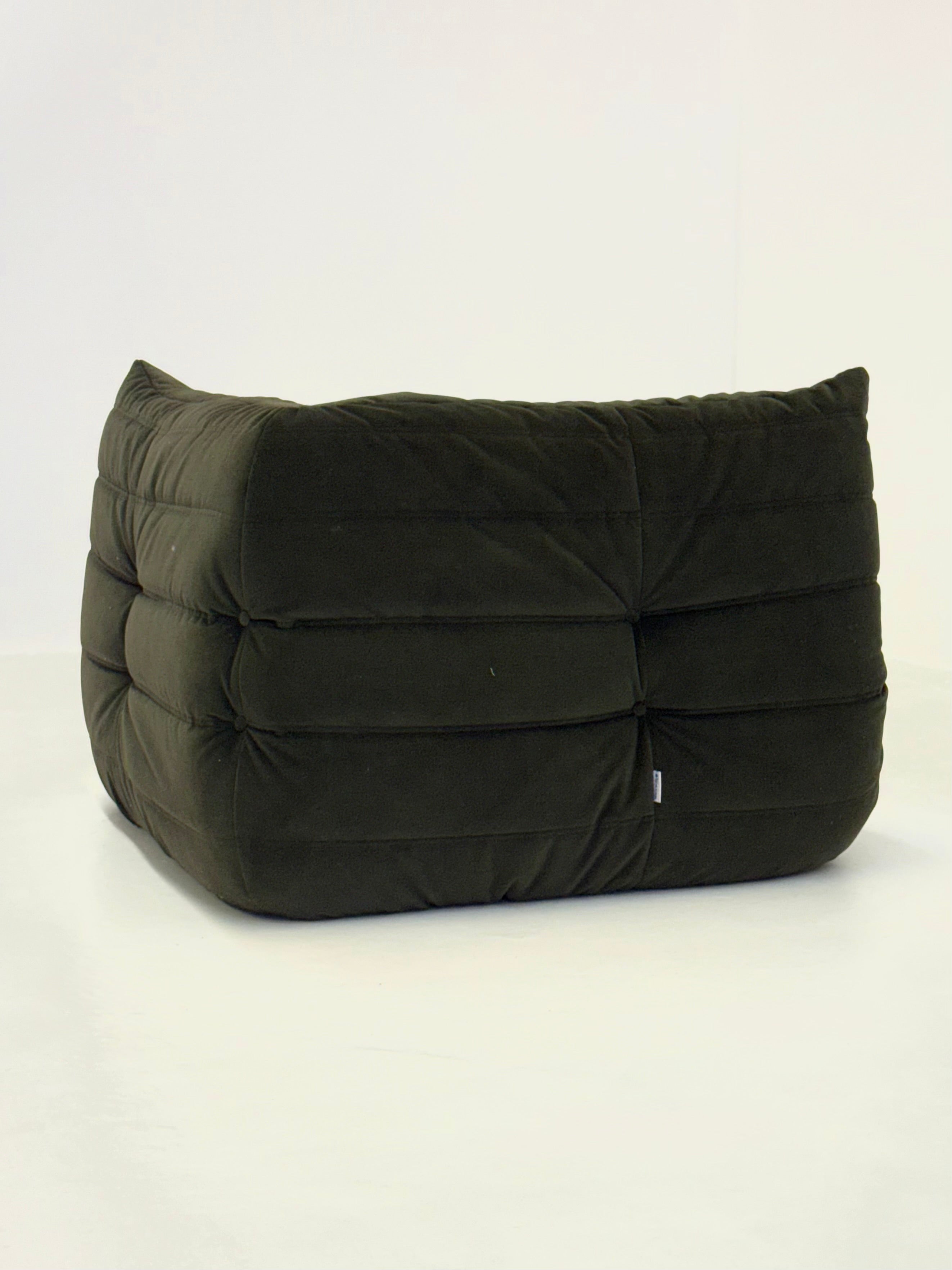 Ligne_Roset_Togo_corner_element_1-seater_in_dark_green_velvet