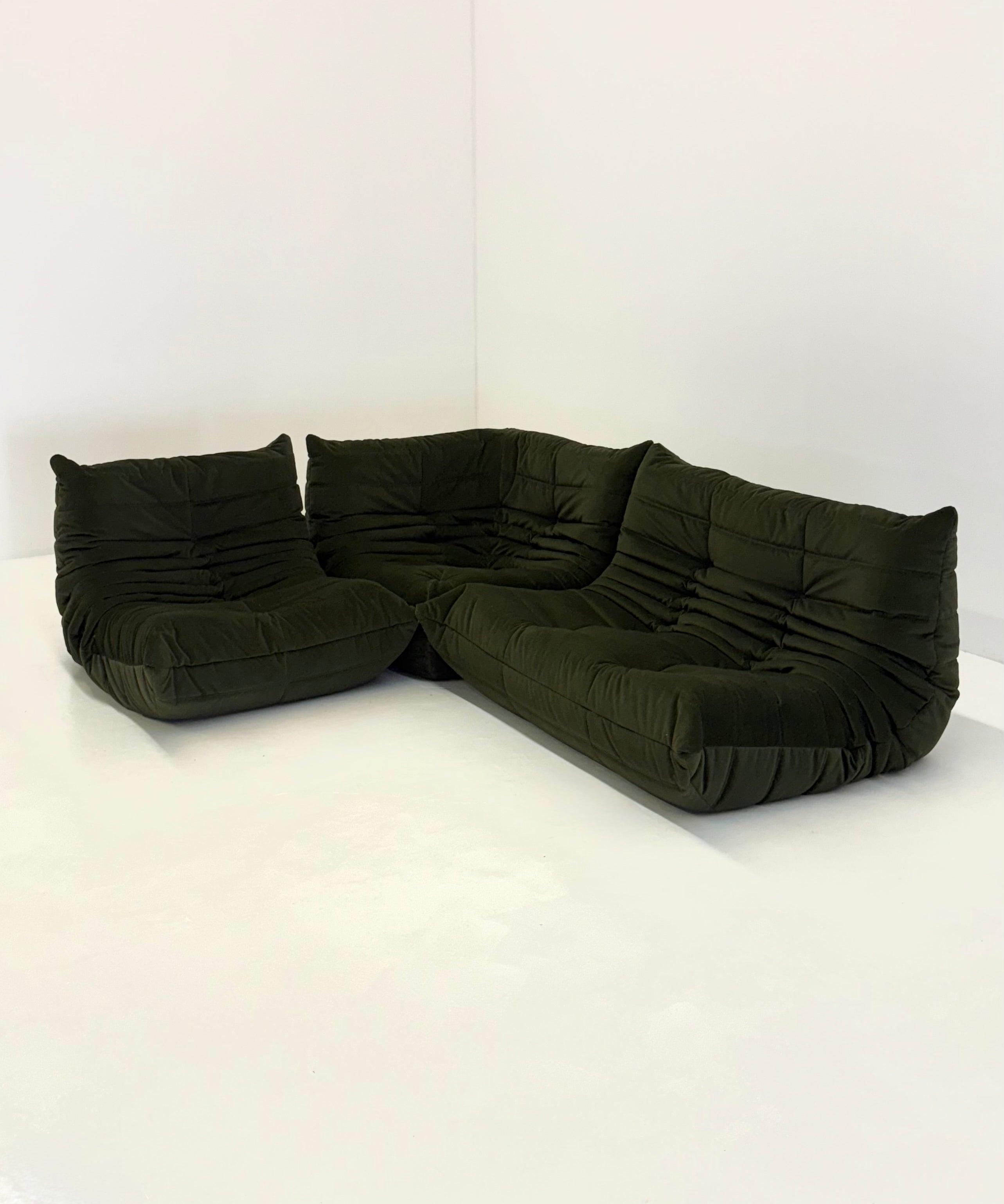 Ligne_Roset_Togo_set_in_dark_green