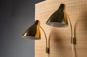 Lisa_Johansson-Pape,_pair_of_1950s_adjustable_brass_wall_sconces_for_ORNO