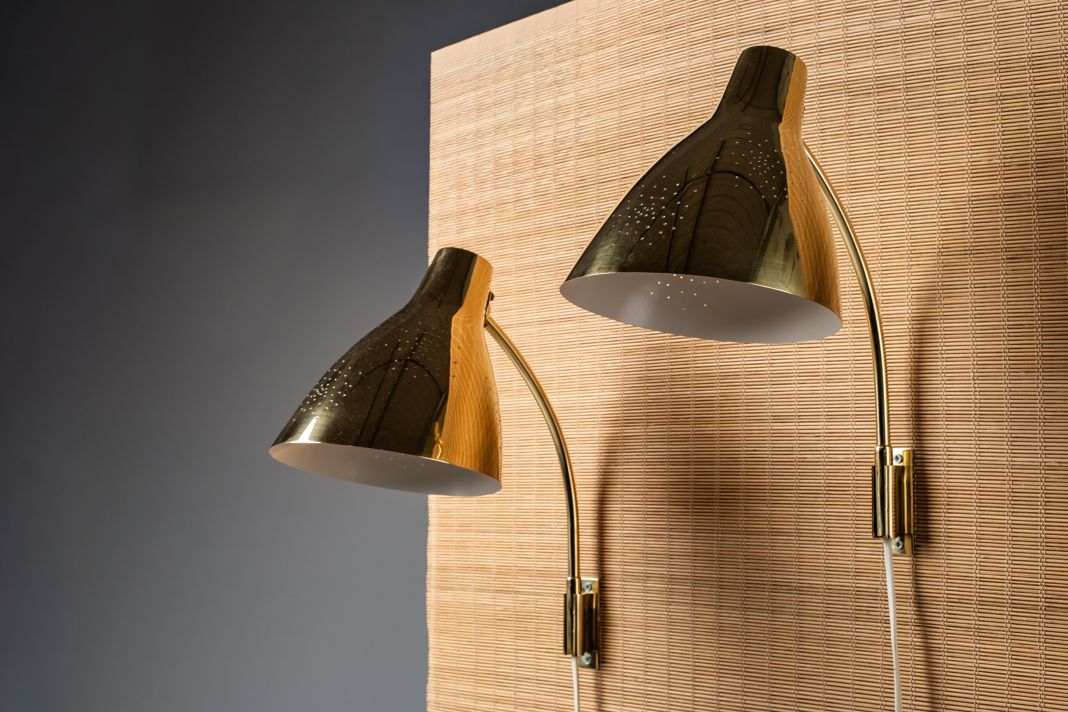 Lisa_Johansson-Pape,_pair_of_1950s_adjustable_brass_wall_sconces_for_ORNO