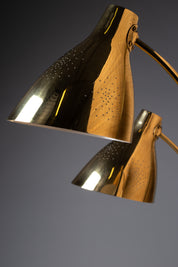 Lisa_Johansson-Pape,_pair_of_1950s_adjustable_brass_wall_sconces_for_ORNO