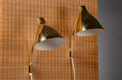 Lisa_Johansson-Pape,_pair_of_1950s_adjustable_brass_wall_sconces_for_ORNO