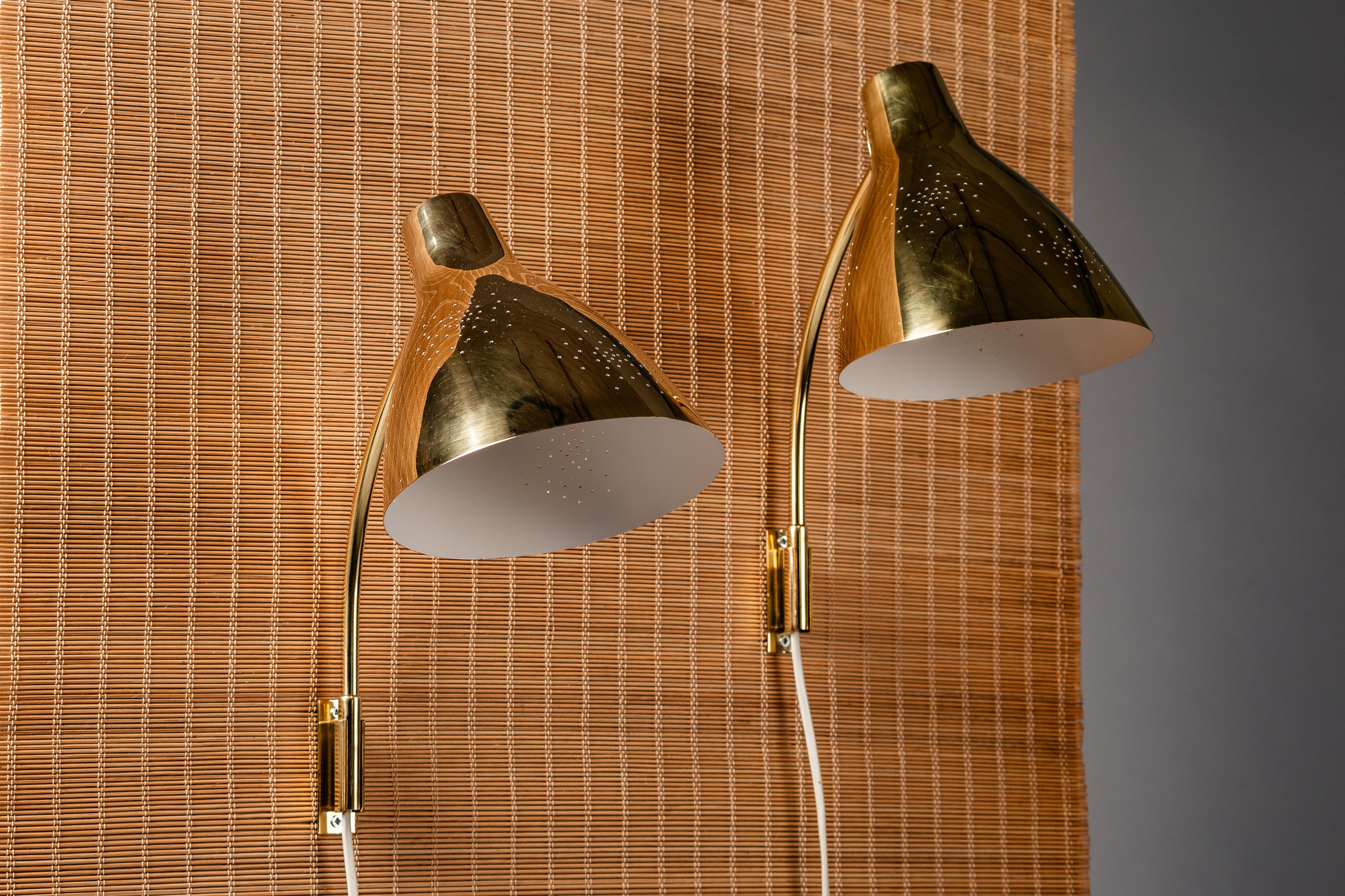 Lisa_Johansson-Pape,_pair_of_1950s_adjustable_brass_wall_sconces_for_ORNO