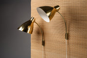 Lisa_Johansson-Pape,_pair_of_1950s_adjustable_brass_wall_sconces_for_ORNO