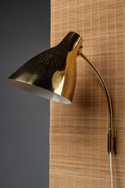 Lisa_Johansson-Pape,_pair_of_1950s_adjustable_brass_wall_sconces_for_ORNO