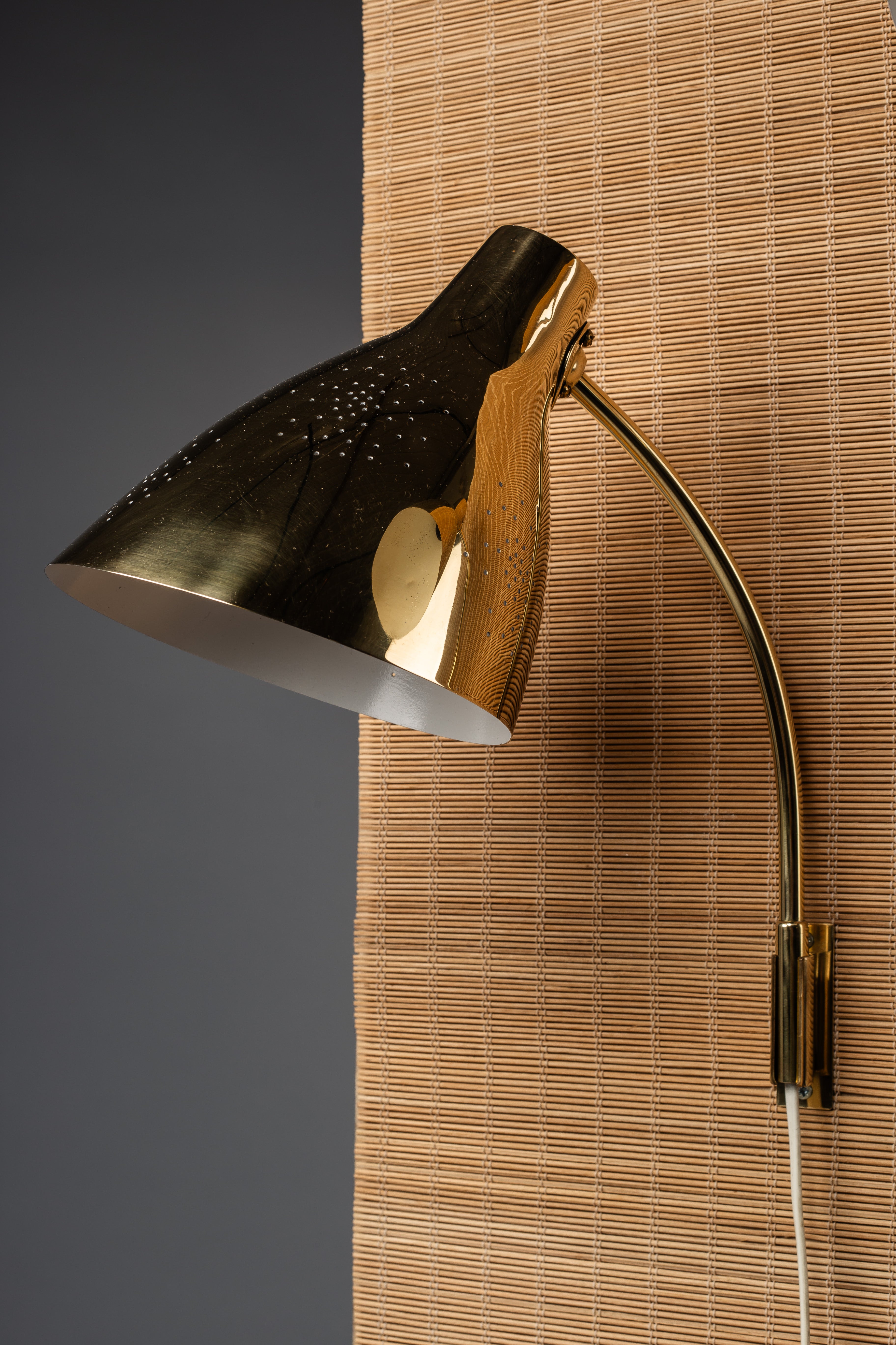 Lisa_Johansson-Pape,_pair_of_1950s_adjustable_brass_wall_sconces_for_ORNO
