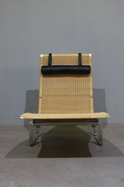 PK24_Lounge_Chair_by_Poul_Kjærholm_for_Fritz_Hansen,_1965,_Denmark
