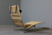 PK24_Lounge_Chair_by_Poul_Kjærholm_for_Fritz_Hansen,_1965,_Denmark