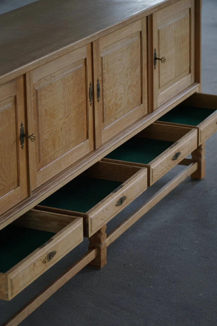 Low_Brutalist_Oak_Sideboard_by_Henning_Kjærnulf,_Danish_Mid_Century_Modern_Credenza,_1960s