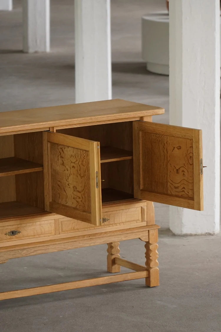 Low_Brutalist_Oak_Sideboard_by_Henning_Kjærnulf,_Danish_Mid_Century_Modern_Credenza,_1960s