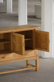 Low_Brutalist_Oak_Sideboard_by_Henning_Kjærnulf,_Danish_Mid_Century_Modern_Credenza,_1960s