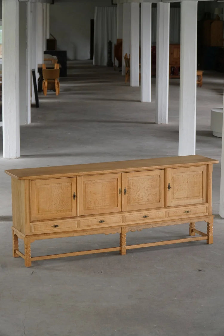 Low_Brutalist_Oak_Sideboard_by_Henning_Kjærnulf,_Danish_Mid_Century_Modern_Credenza,_1960s