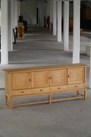 Low_Brutalist_Oak_Sideboard_by_Henning_Kjærnulf,_Danish_Mid_Century_Modern_Credenza,_1960s