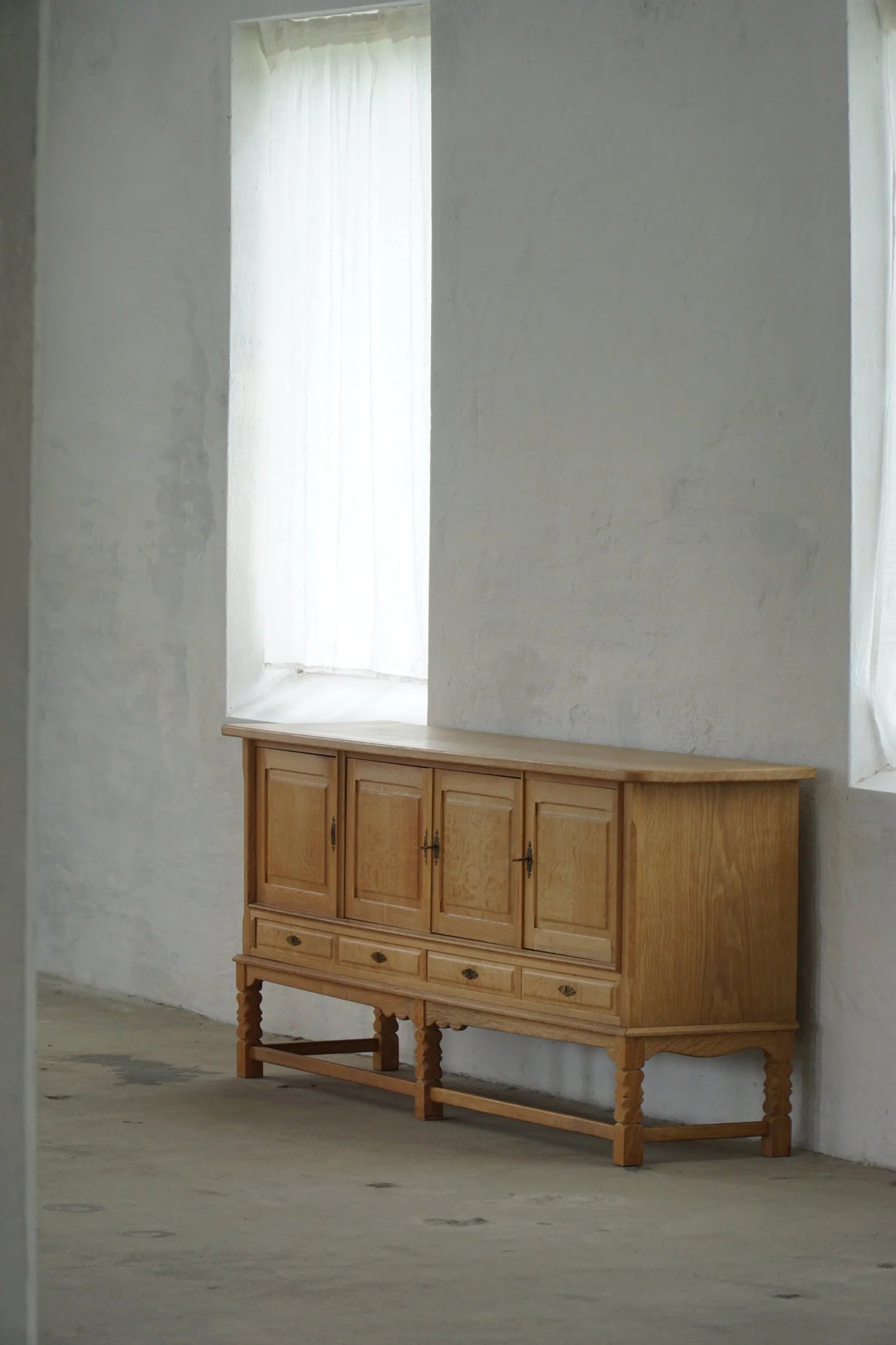 Low_Brutalist_Oak_Sideboard_by_Henning_Kjærnulf,_Danish_Mid_Century_Modern_Credenza,_1960s