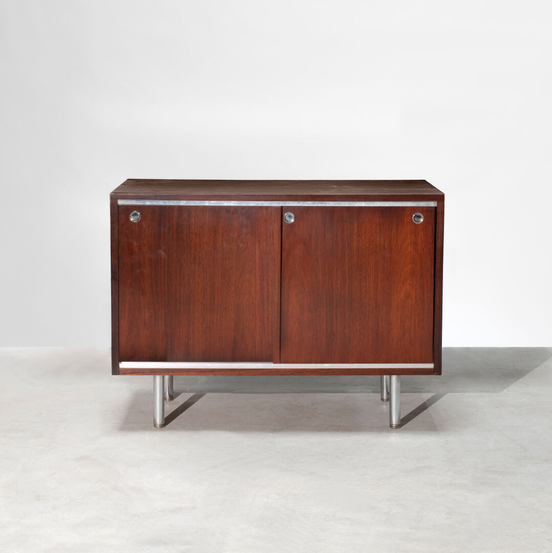 Low_credenza_in_rosewood_with_sliding_doors_by_George_Nelson_for_Herman_Miller