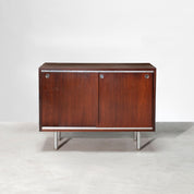 Low_credenza_in_rosewood_with_sliding_doors_by_George_Nelson_for_Herman_Miller