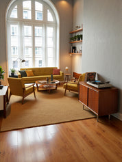 Low_credenza_in_rosewood_with_sliding_doors_by_George_Nelson_for_Herman_Miller
