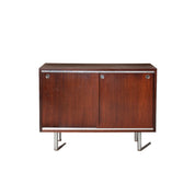 Low_credenza_in_rosewood_with_sliding_doors_by_George_Nelson_for_Herman_Miller