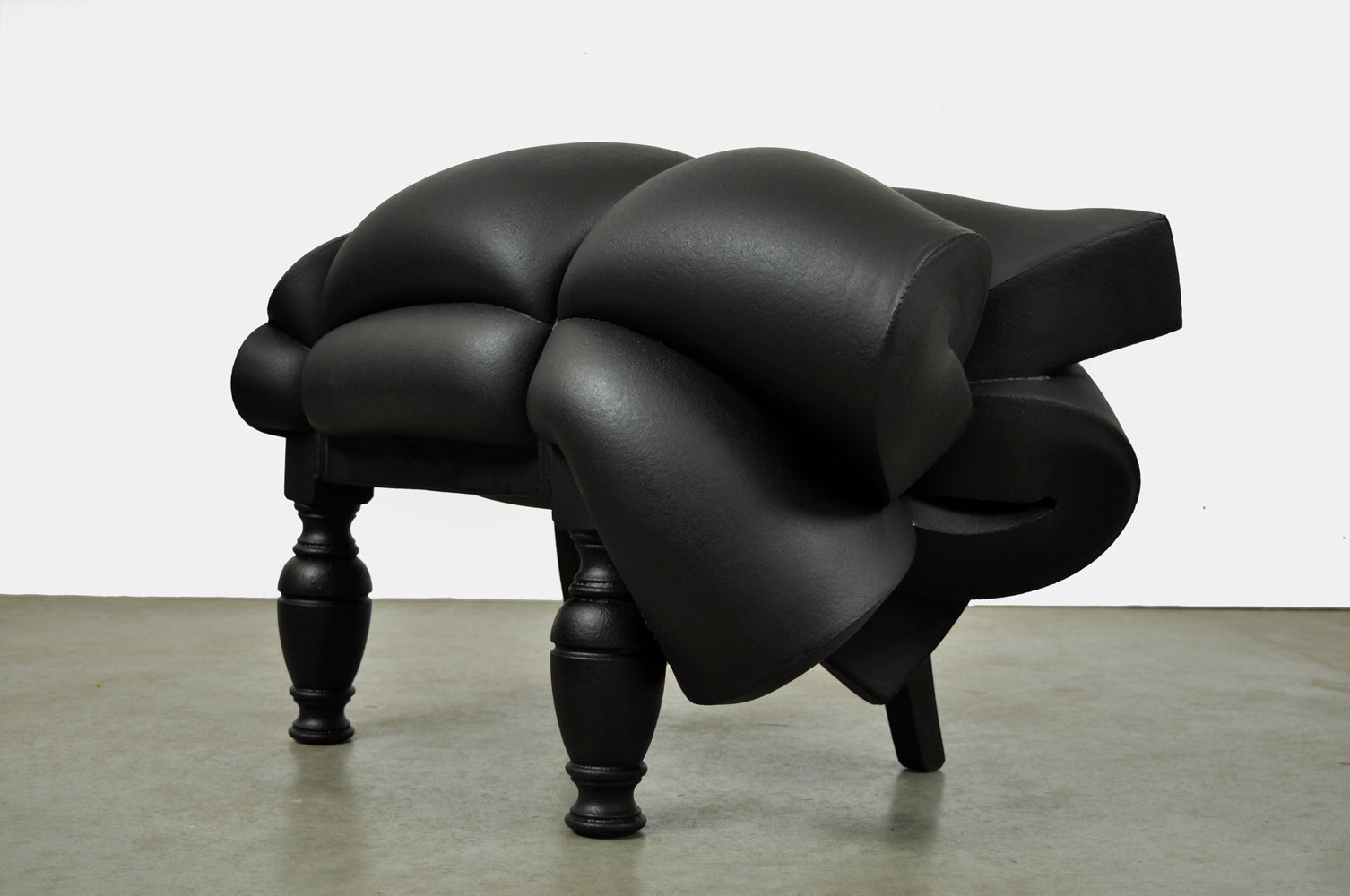 Set_of_Madam_Rubens_chair_&_stool_by_Frank_Willems,_recycled_material,_2000