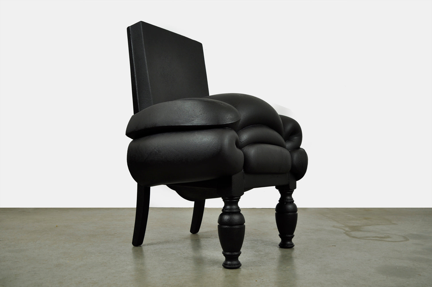 Set_of_Madam_Rubens_chair_&_stool_by_Frank_Willems,_recycled_material,_2000