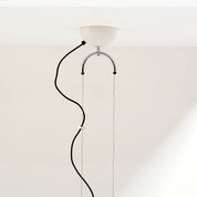 Franco_Bresciani_Manta_Counterweight_Pendant_Lamp_for_iGuzzini_in_Cream_Plastic_and_Chrome,_Italy,_1970s