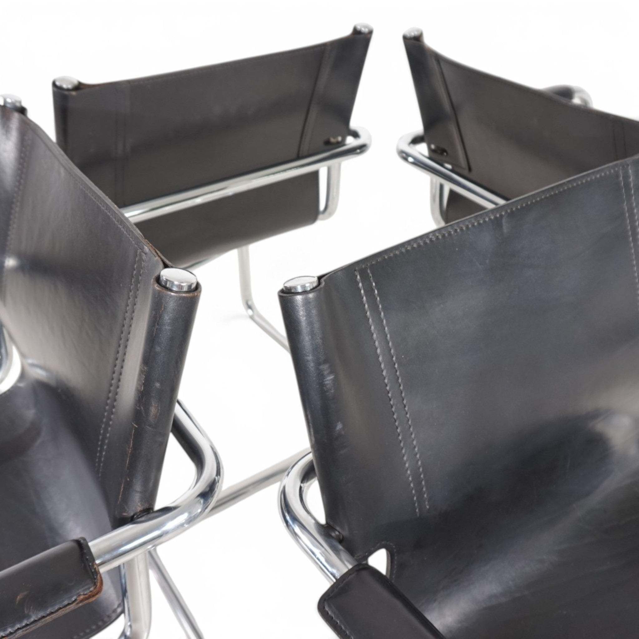 Set_of_4_Visitor_Chairs_by_Matteo_Grassi,_Black_Saddle_Leather_and_Chrome,_Italy