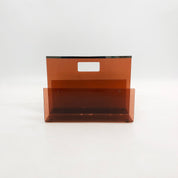 Michel_Dumas_Smoked_Acrylic_Magazine_Rack_for_Roche_Bobois,_1970s