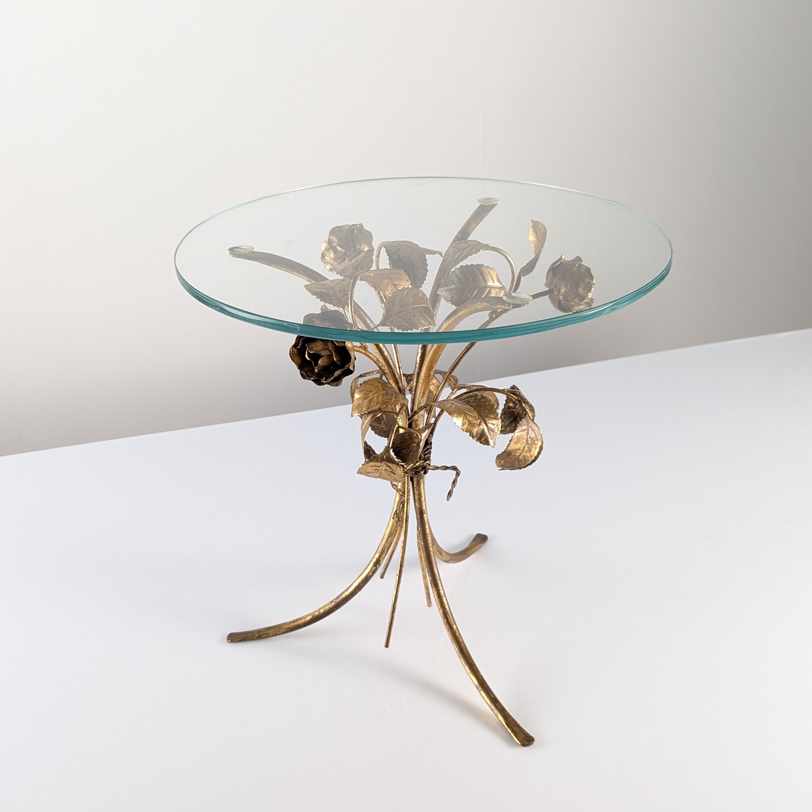 Hollywood_Regency_Gilt_Metal_Rose_Side_Table_with_Clear_Glass_Top,_1970s